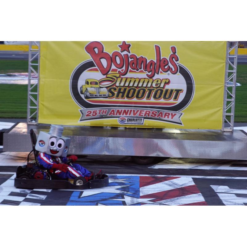 Lug Nut celebrated his birthday with a convincing win in the Mascot Mania go-kart race during Tuesday's Bojangles' Summer Shootout at Charlotte Motor Speedway.