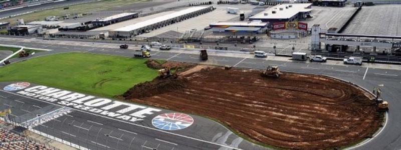 Charlotte Motor Speedway began installing more than 88,000 square feet of Sports Fields synthetic turf to its frontstretch on Wednesday.