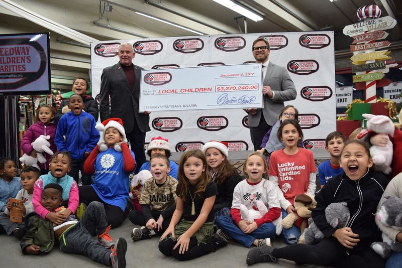 Marcus Smith, the president and CEO of Speedway Motorsports, Inc., and vice chairman of Speedway Children’s Charities, joined Maj. Gen. Chuck Swannack, the executive director of Speedway Children’s Charities, as well as local youth in presenting a check for $3,270,240 to be used among 435 children’s charities across the country. The check presentation was part of a special ceremony on Wednesday at Charlotte Motor Speedway.