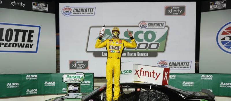 Joe Gibbs Racing driver Kyle Busch held off Austin Cindric to win Monday's Alsco 300 at Charlotte Motor Speedway.
