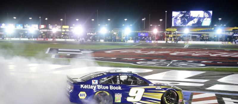 Chase Elliott celebrates winning the Alsco Uniforms 500 at Charlotte Motor Speedway.