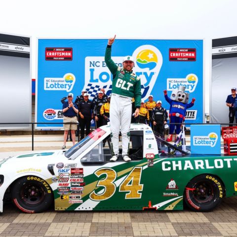 Layne Riggs celebrates after winning Sunday's NC Education Lottery 200 NASCAR CRAFTSMAN Truck Series race at Charlotte Motor Speedway.