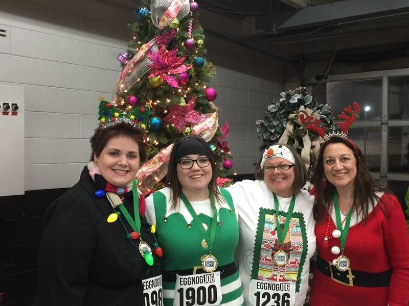Monica Galea (far right) and members of Monica’s Fabulous Weight Watchers team after the 2016 Egg Nog Jog 5K at Charlotte Motor Speedway.