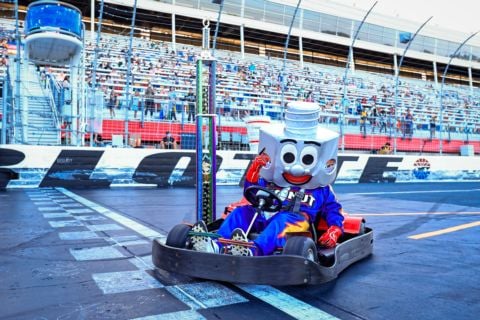 Lug Nut celebrates another trip to Victory Lane after defending his Mascot Mania Go-Kart Race title during Round 8 of Cook Out Summer Shootout.
