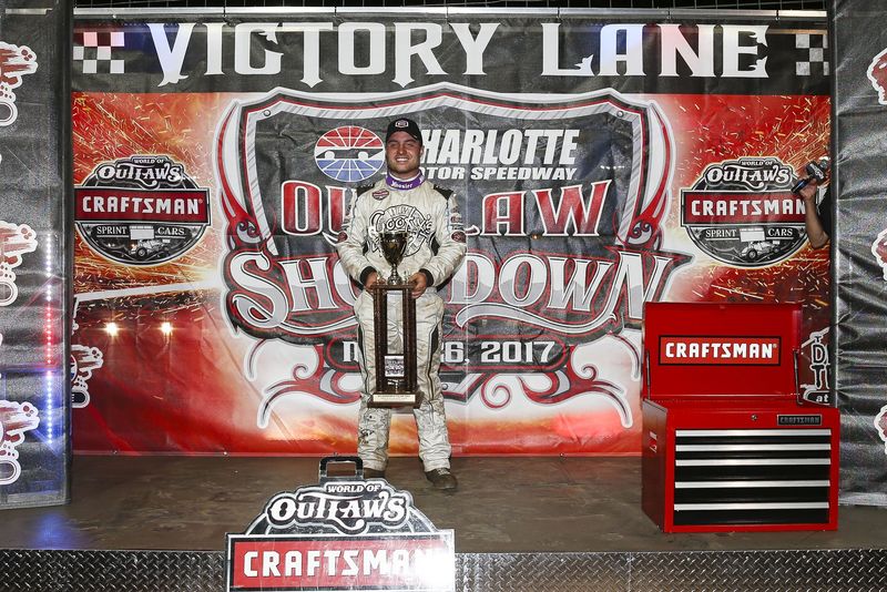 Logan Schuchart celebrates Friday after winning the World of Outlaws Craftsman Sprint Cars' Outlaw Showdown at The Dirt Track at Charlotte.