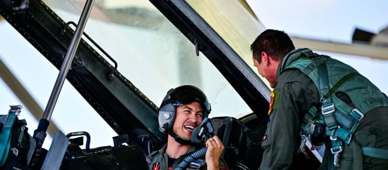 Coca-Cola Racing Family driver Joey Logano gets final instruction from Lt. Col. Daniel “Rage” Trueblood, commander of the 77th Fighter Squadron, before a training flight during a Mission 600 visit to Shaw Air Force Base on Tuesday, May 7, 2024.