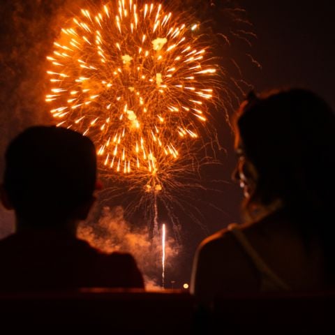 Fireworks illuminate the night sky as fans ring in the Fourth of July weekend during Cook Out Summer Shootout’s Red, White & Vroom night presented by Pro-FABrication.