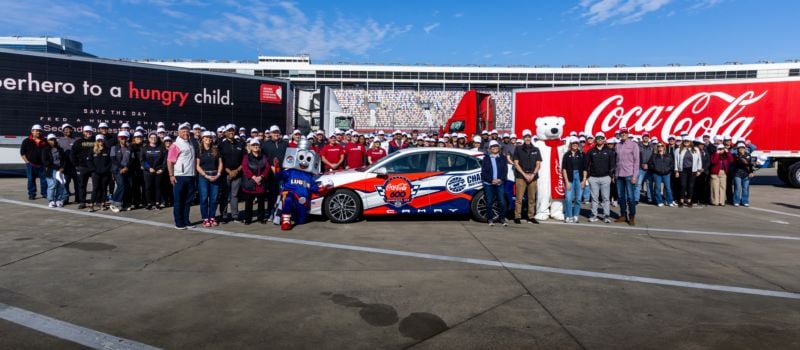 More than 150 volunteers gathered at Charlotte Motor Speedway to package 50,000 meals for Charlotte area families in need.