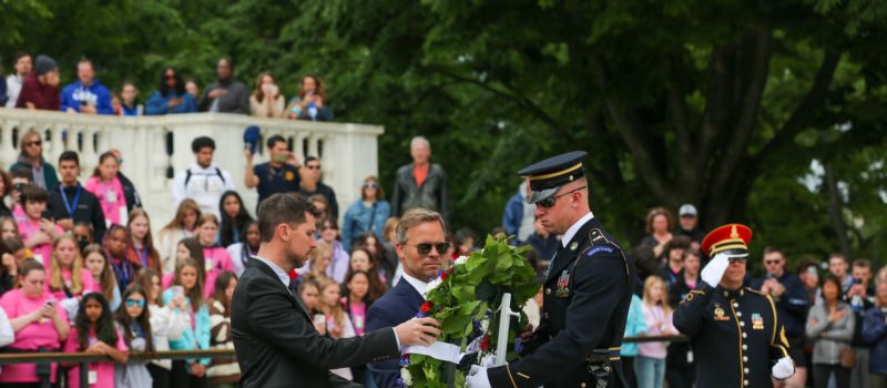 Defending Coca-Cola 600 winner Denny Hamlin and Speedway Motorsports President and CEO Marcus Smith lay a wreath at the Tomb of the Unknown Soldier at Arlington National Cemetery on Wednesday, May 3, 2023. 