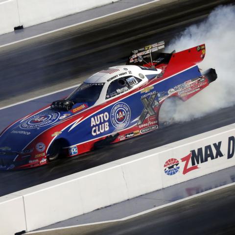 Robert Hight posted the fastest time in Funny Car qualifying during Saturday's penultimate day of NGK Spark Plugs NHRA Four-Wide Nationals action at zMAX Dragway.