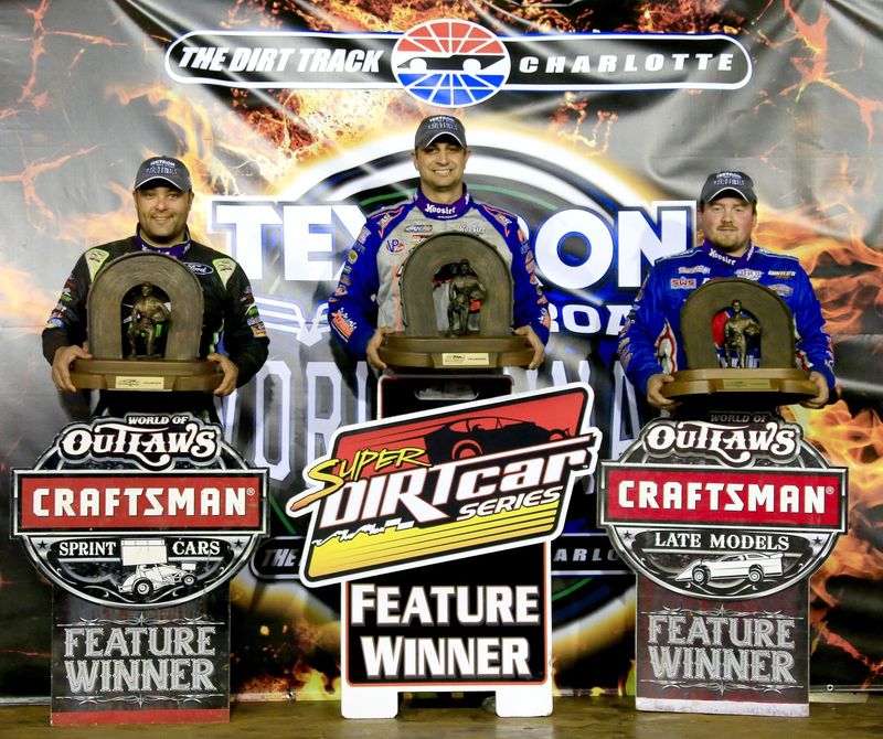 Donny Schatz, left, joined Matt Sheppard, middle, and Brandon Sheppard as champions after Saturday's Textron Off Road World of Outlaws World Finals at The Dirt Track at Charlotte.