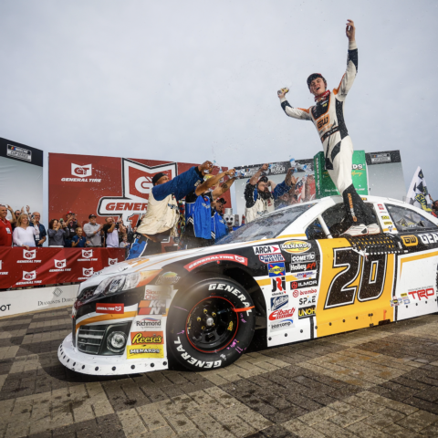 Jesse Love celebrates after winning Friday's ARCA Menards Series General Tire 150 at Charlotte Motor Speedway.