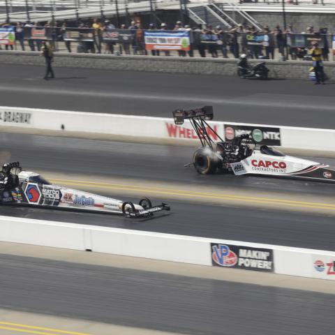 Defending NTK NHRA Carolina Nationals winner Steve Torrence, right, got the jump on Antron Brown, left, and the rest of the Top Fuel field by hanging on to the No. 1 seed after Saturday's qualifying at zMAX Dragway.