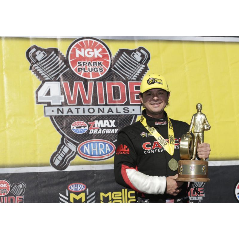 Top Fuel driver Steve Torrence captured his second consecutive NGK Spark Plugs NHRA Four-Wide Nationals victory on Sunday at zMAX Dragway.