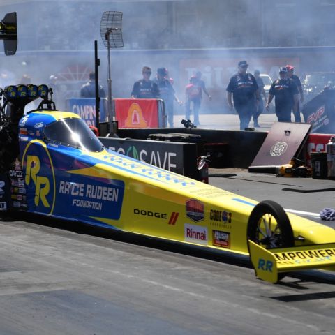 Tony Stewart returns to zMAX Dragway for the American Rebel Light NHRA 4-Wide Nationals, April 25-27, aiming to make history as the 1,000th Top Fuel race winner and add a second Wally to his growing NHRA legacy.