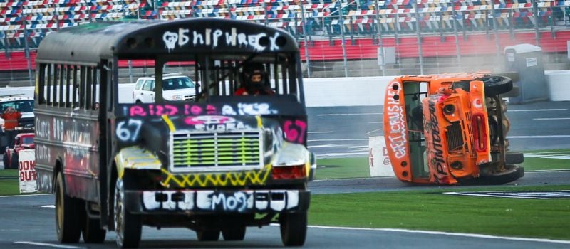 Payton Mannie with WGHP pulls away from the field to take the Media Mayhem school bus win during Round 2 of the Cook Out Summer Shootout at Charlotte Motor Speedway.
