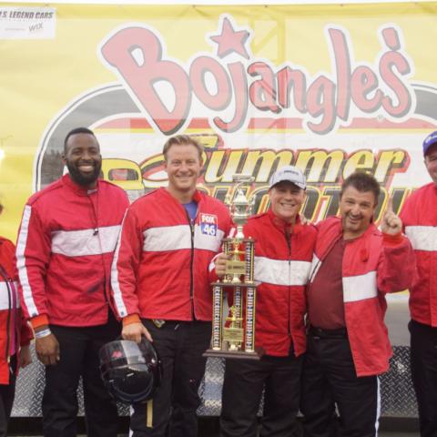  left, Spectrum News' Courtney Davis, WCCB's Zach Aldridge, FOX 46 Carolinas' Will Kunkel, WBTV's Al Conklin, WROQ's J.D. Stone and WSOC's Andrew Perdue battled it out in school buses on Charlotte Motor Speedway's frontstretch quarter-mile on Tuesday, with Conklin hanging on for his fifth win.