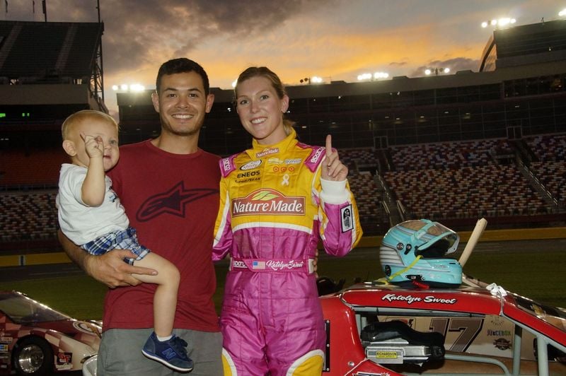 Katelyn Sweet, right, the girlfriend of NASCAR Sprint Cup Series driver Kyle Larson, middle, was fastest in Monday's Better Half Dash presented by Nature Made qualifying session at Charlotte Motor Speedway. 