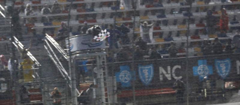 AJ Allmendinger takes the checkered flag at the conclusion of the rain-soaked Drive for the Cure 250 presented by BlueCross BlueShield of North Carolina, earning his second consecutive Xfinity Series victory on Charlotte Motor Speedway's innovative ROVAL.