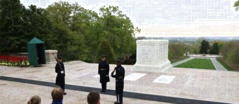 Left to right) Paige Keselowski, Brad Keselowski, Rep. Richard Hudson, Marcus Smith and Greg Walter watch a changing-of-the-guard ceremony at the iconic Tomb of the Unknown Soldier during a visit to the Arlington National Cemetery on Wednesday to kick off Charlotte Motor Speedway's Mission 600. 