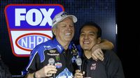 NHRA Funny Car champion John Force jokes with driver-turned-analyst Tony Pedregon during Toyota Tuesday at the Charlotte Motor Speedway Media Tour presented by Technocom.