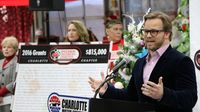 Speedway Children's Charities President Marcus Smith talks about the impact of the national organization during the 2016 Speedway Children's Charities grant distribution event Wednesday at Charlotte Motor Speedway.