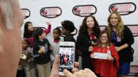 Guests posed for photos, enjoyed cookies and coffee, met Santa and toured the Speedway Christmas light show during the 2016 Speedway Children's Charities grant distribution event Wednesday at Charlotte Motor Speedway.