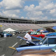 Cars line the frontstretch during the opening day of the Pennzoil AutoFair presented by Advance Auto Parts.