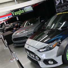Inside the Showcase Pavilion, a display of drift cars belonging to three-time world champion drifter Vaughn Gittin Jr. sits on display during the opening day of the Pennzoil AutoFair presented by Advance Auto Parts.