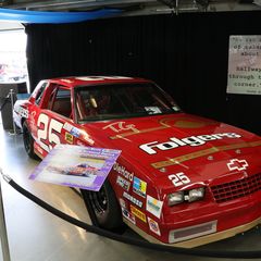 A street-legal stock car donning the colors of NASCAR great Tim Richmond sits in the Showcase Pavilion during the opening day of the Pennzoil AutoFair presented by Advance Auto Parts.