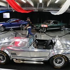 A metalic Shelby Mustang turns heads during the opening day of the Pennzoil AutoFair presented by Advance Auto Parts.