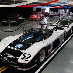 Two of NASCAR Hall of Famer Rick Hendricks Chevy GTSs pay tribute to Charlotte Motor Speedway's upcoming ROVAL race as part of a collection of road course race cars on display during the opening day of the Pennzoil AutoFair presented by Advance Auto Parts.