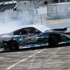 Fans enjoy drift car ride alongs with East 10 Drift during opening day of the Pennzoil AutoFair presented by Advance Auto Parts at Charlotte Motor Speedway.