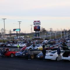 Cars filled the fan zone parking lot during the inaugural Cars and Coffee Concord at Charlotte Motor Speedway.