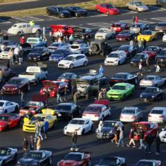 Cars filled the fan zone parking lot during the inaugural Cars and Coffee Concord at Charlotte Motor Speedway.