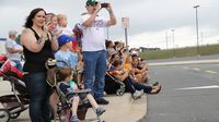 Fans take in all the action during the eighth annual Parade of Power at Charlotte Motor Speedway.