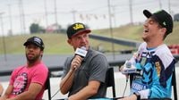 (Left to right) NASCAR XFINITY Series driver Bubba Wallace Jr., NASCAR Sprint Cup Series driver Clint Bowyer and MXGP rider Phil Nicoletti share a laugh during a fan Q&A at the eighth annual Parade of Power at Charlotte Motor Speedway.