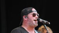 Country music star Lee Brice performs during the Coca-Cola 600 pre-race concert presented by Advance Auto Parts SpeedPerks at the Coca-Cola 600 at Charlotte Motor Speedway.