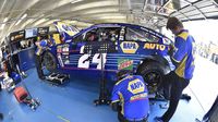 Chase Elliott's crew works in the garage during practice for Sunday's Coca-Cola 600 at Charlotte Motor Speedway.