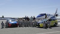 Military personnel pose for a photo with NASCAR Sprint Cup Series driver Matt Kenseth, Charlotte Motor Speedway President and General Manager Marcus Smith and Bank of America's Charlotte and North Carolina President Charles Bowman during a three-city tour to preview the NASCAR Chase Across America and the Bank of America 500.