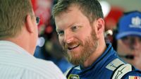 Dale Earnhardt Jr. takes a break between practice runs during Bojangles' Pole Night at Charlotte Motor Speedway.