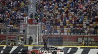 Austin Dillon salutes the crowd after winning Friday's Drive for the Cure 300 presented by Blue Cross Blue Shield of North Carolina.