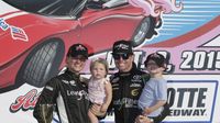 Shannon Koch and her family (including NASCAR driver Blake Koch) celebrate Shannon's Better Half Dash win during Bojangles' Pole Night at Charlotte Motor Speedway.