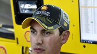 Joey Logano waits in the garage before practice for Saturday's Bank of America 500 at Charlotte Motor Speedway.