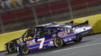 Regan Smith battles for position during Friday's Drive for the Cure 300 presented by Blue Cross Blue Shield of North Carolina.