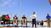 Charlotte Motor Speedway President and General Manager Marcus Smith greets a special panel of guests, including NASCAR drivers Ty and Austin Dillon and motorsports analyst Wendy Venturini, on hand for the seventh annual Parade of Power at Charlotte Motor Speedway on Wednesday.