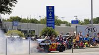 NASCAR Sprint Cup Series driver Austin Dillon does a burnout in front of cheering fans during the seventh annual Parade of Power at Charlotte Motor Speedway on Wednesday.