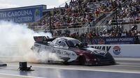 Tim Wilkerson warms his tires during opening day at the NHRA Carolina Nationals at zMAX Dragway.