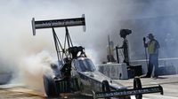 Brittany Force completes a burnout during opening day at the NHRA Carolina Nationals at zMAX Dragway.