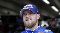 Justin Allgaier in the garage during Thursday's LiftMaster Pole Night at Charlotte Motor Speedway.